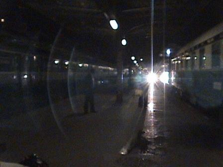 Night meeting at the Gare de l'Est in Paris while the Orient-Express waits.